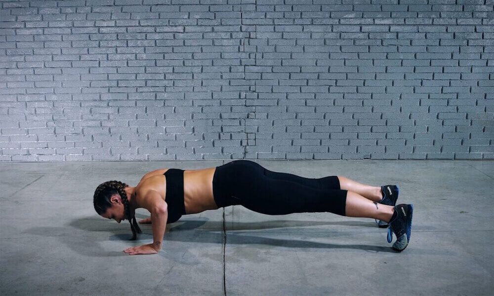 How to perform the push-up hold for increased stability and strength?